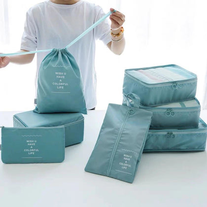 Kit Organizador Mala Viagem Bolsa 7 Peças Impermeável Necessaire. Azul claro / bege.